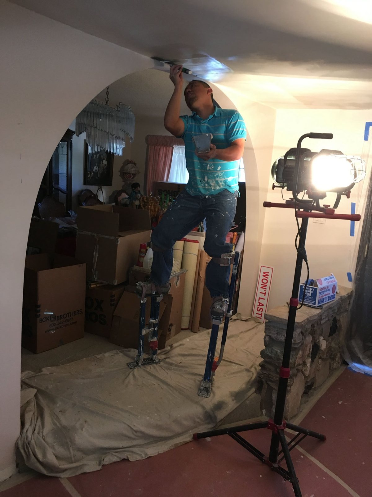 Infinity Kitchens and Baths crew doing drywall and plaster work